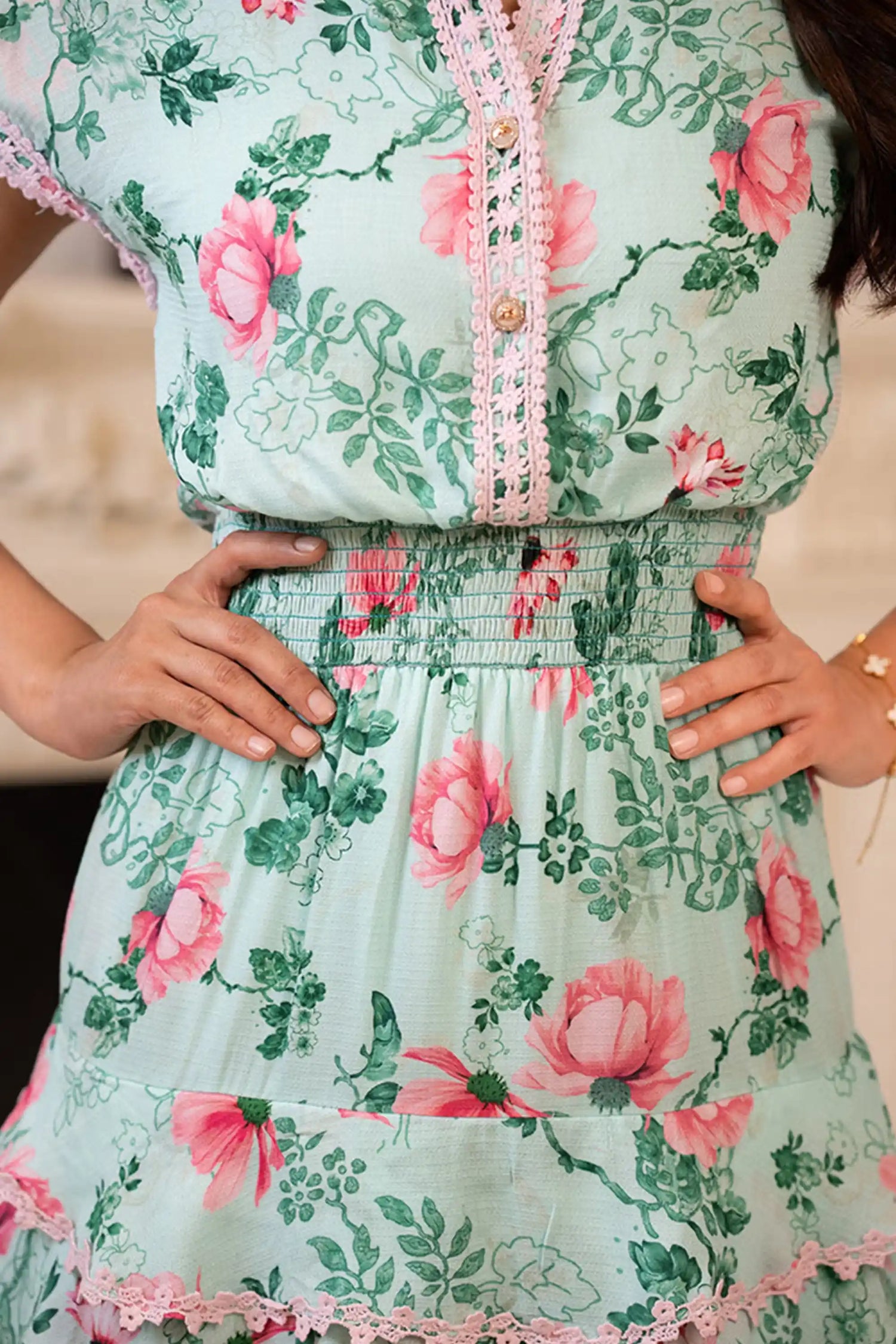 Mint green floral ruffle short dress waist detail closeup