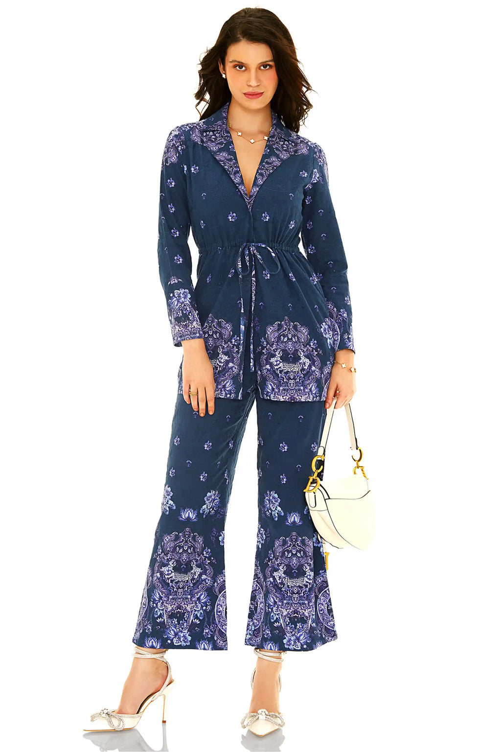 Front view of navy blue floral coord set featuring belted long shirt and pants