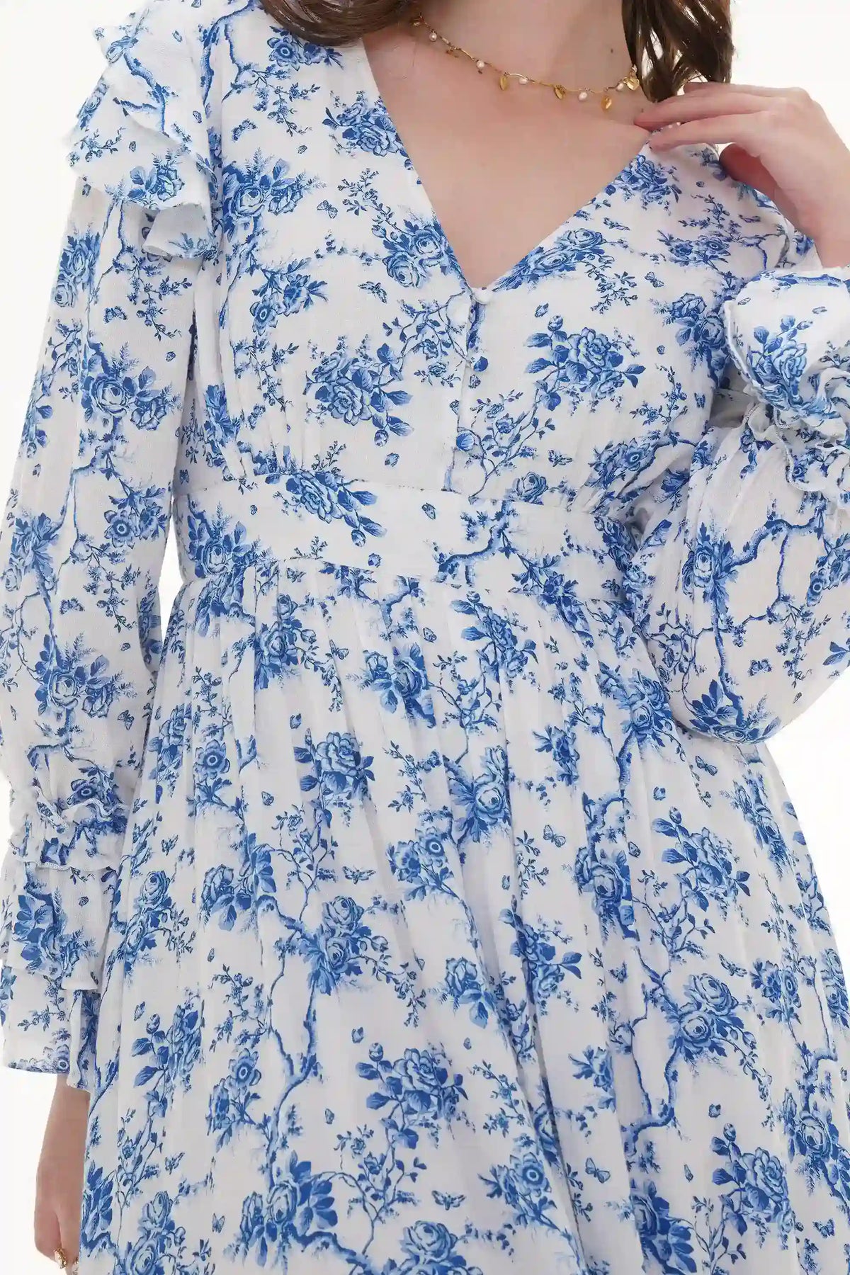 Close-up of Pretty Pixie navy floral belted puff-sleeve mini dress