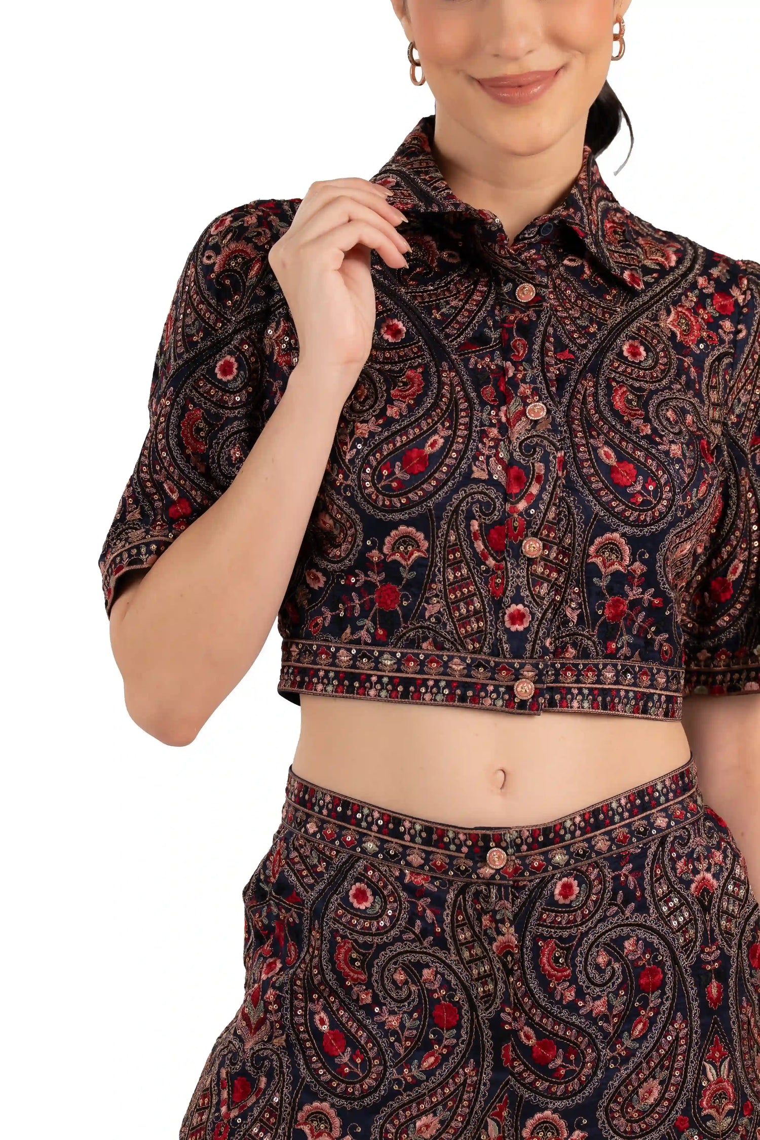 Close-up of collar and buttons on navy paisley crop shirt co-ord top