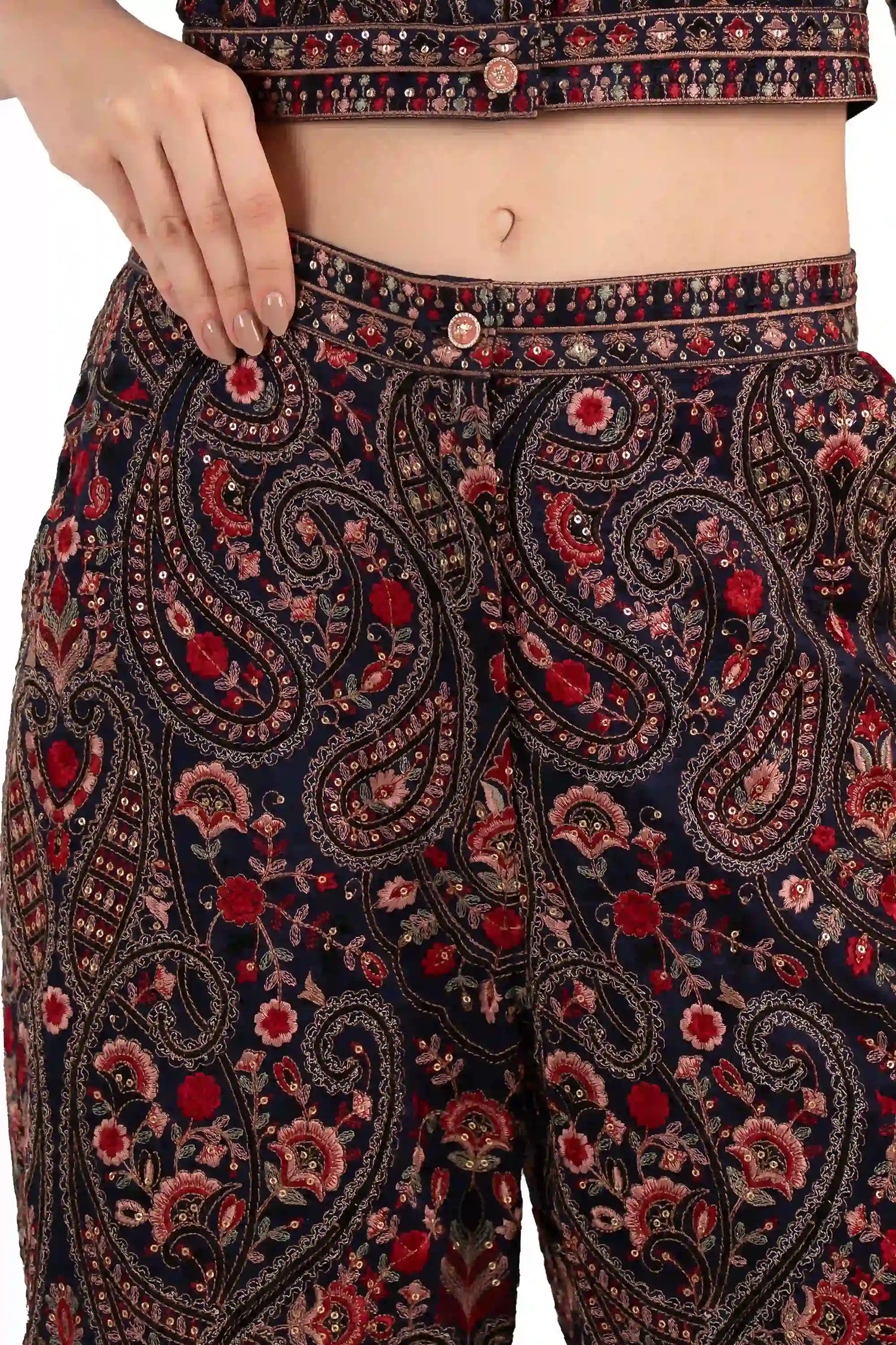 Close-up of embroidered waistband and paisley detailing on women's palazzo pants, Indian ethnic fashion