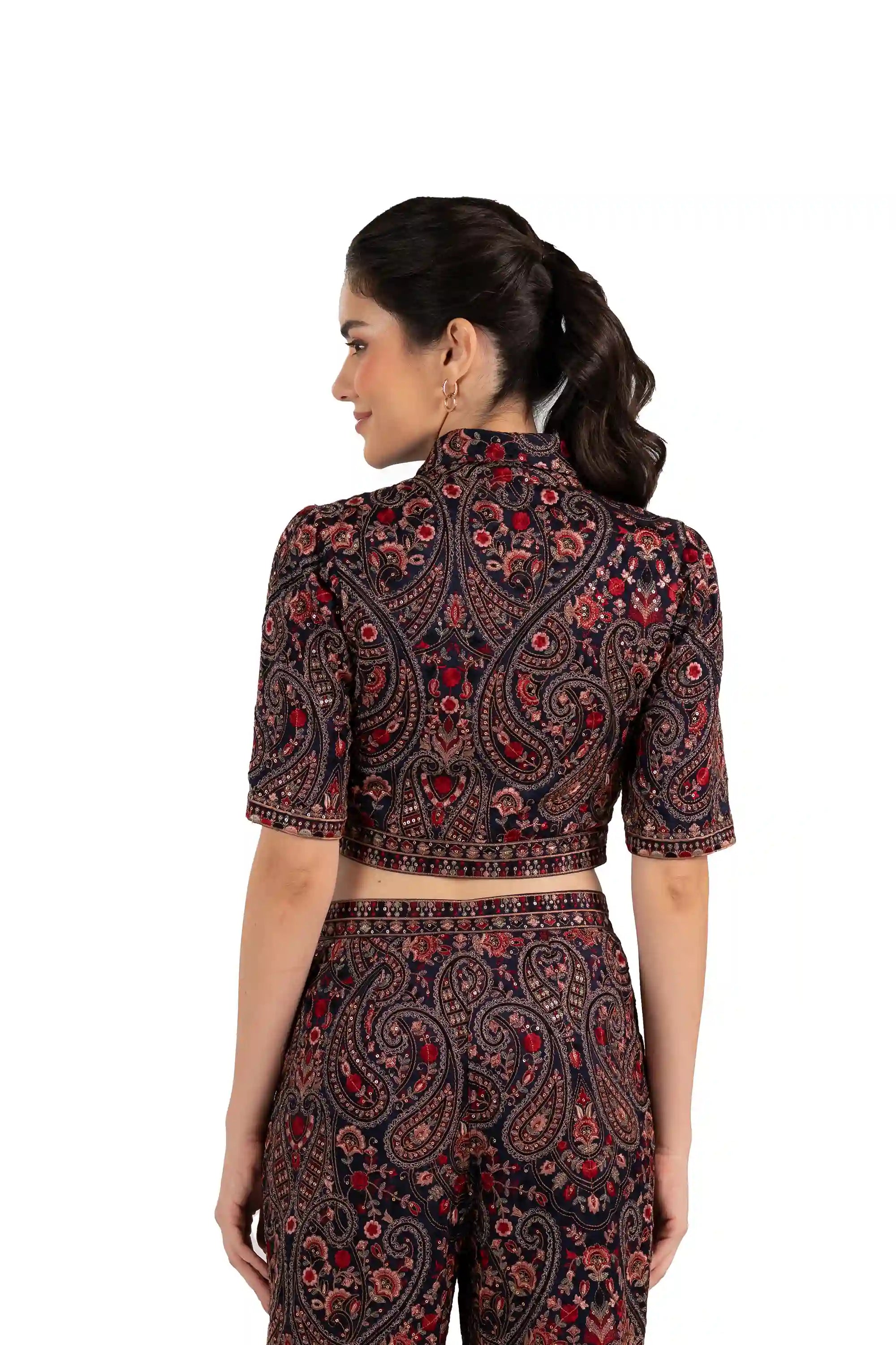 Back view of woman in paisley print crop top, Indian ethnic shirt blouse, with embroidery and short sleeves