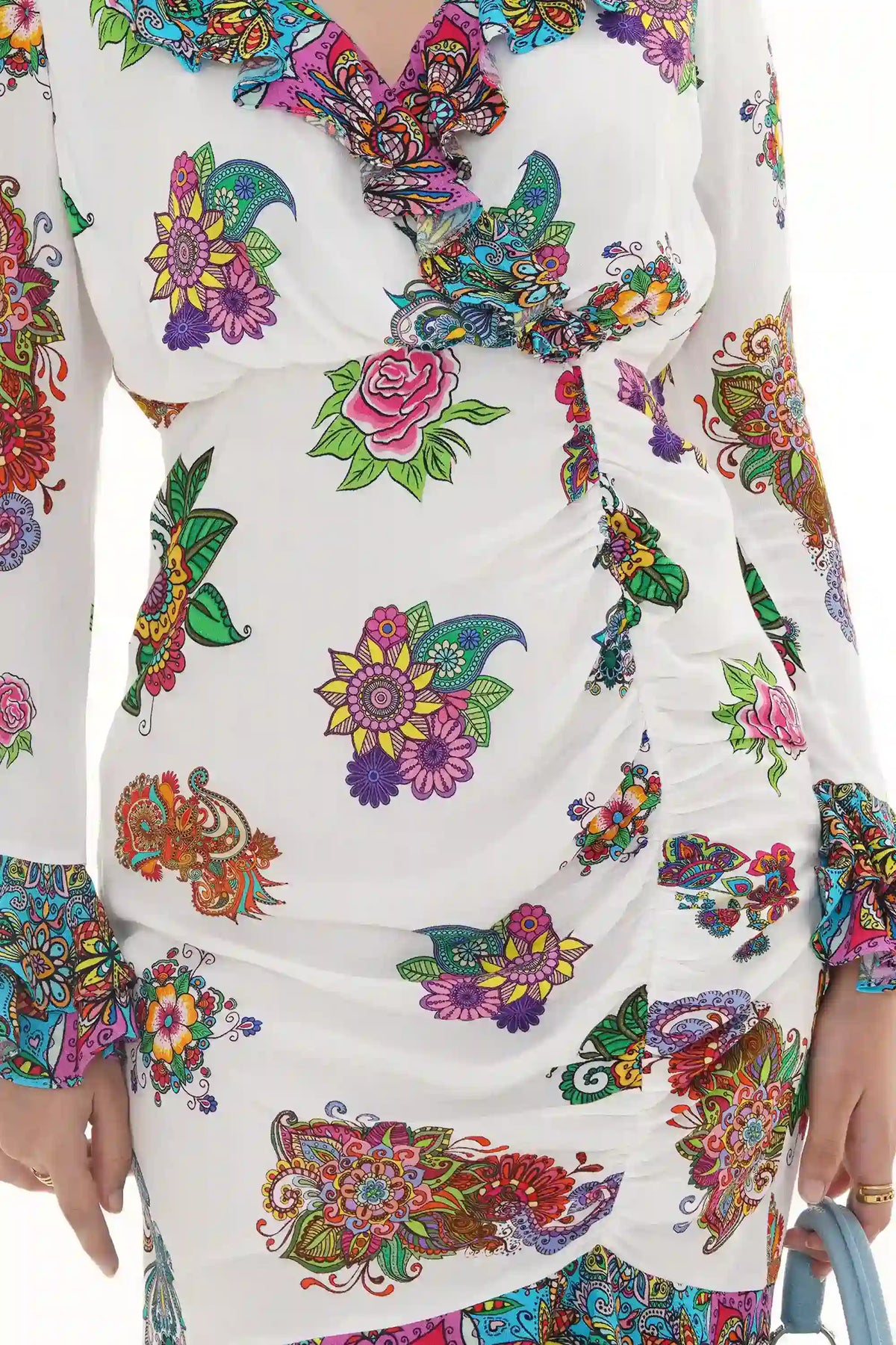 Close-up of Pretty Pixie pastel floral puff-sleeve mini dress