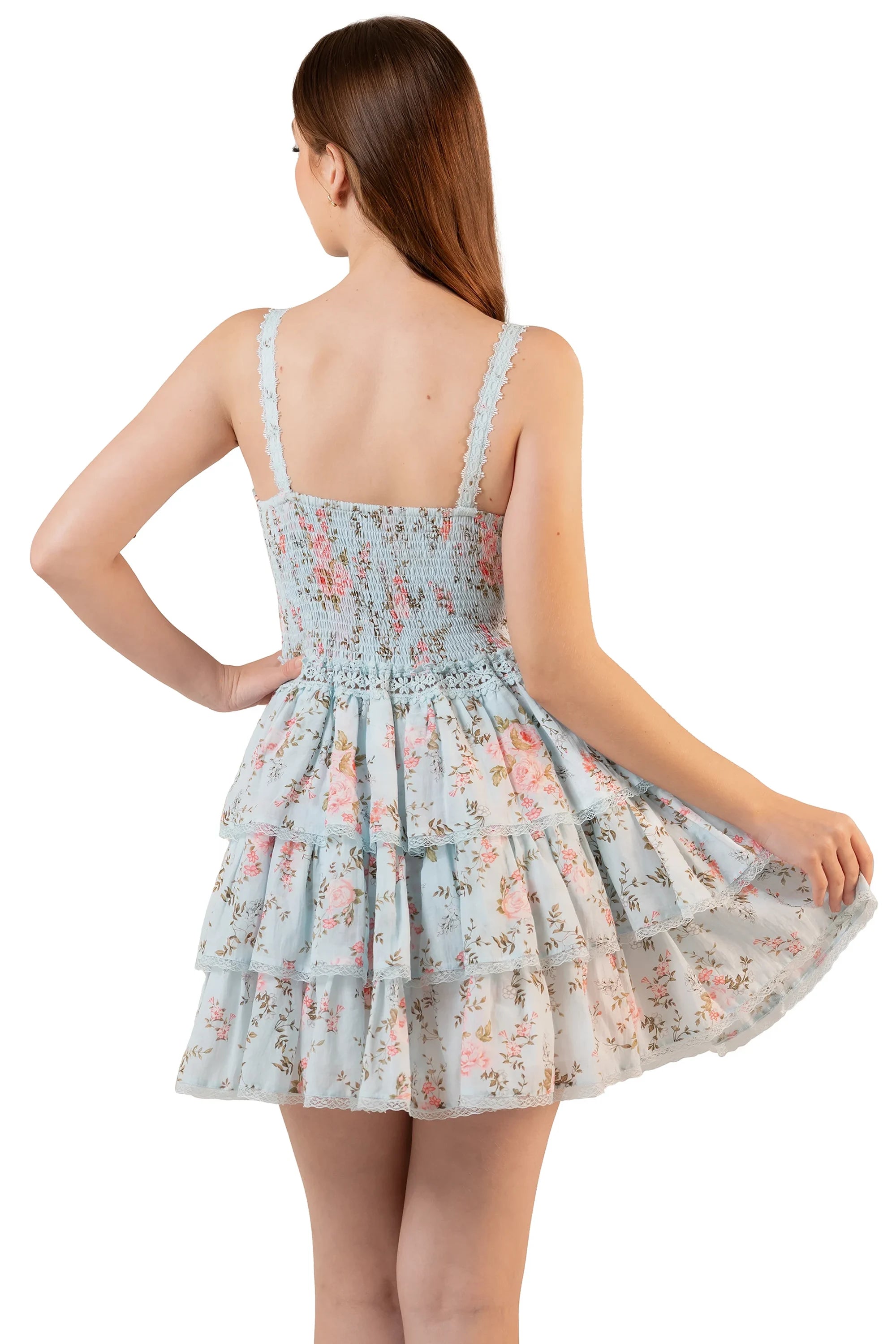 Back view: pastel floral tiered mini dress with smocked bodice