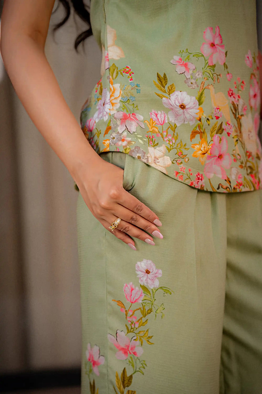 Pocket detail of pastel green floral coord set with floral embroidery on pants