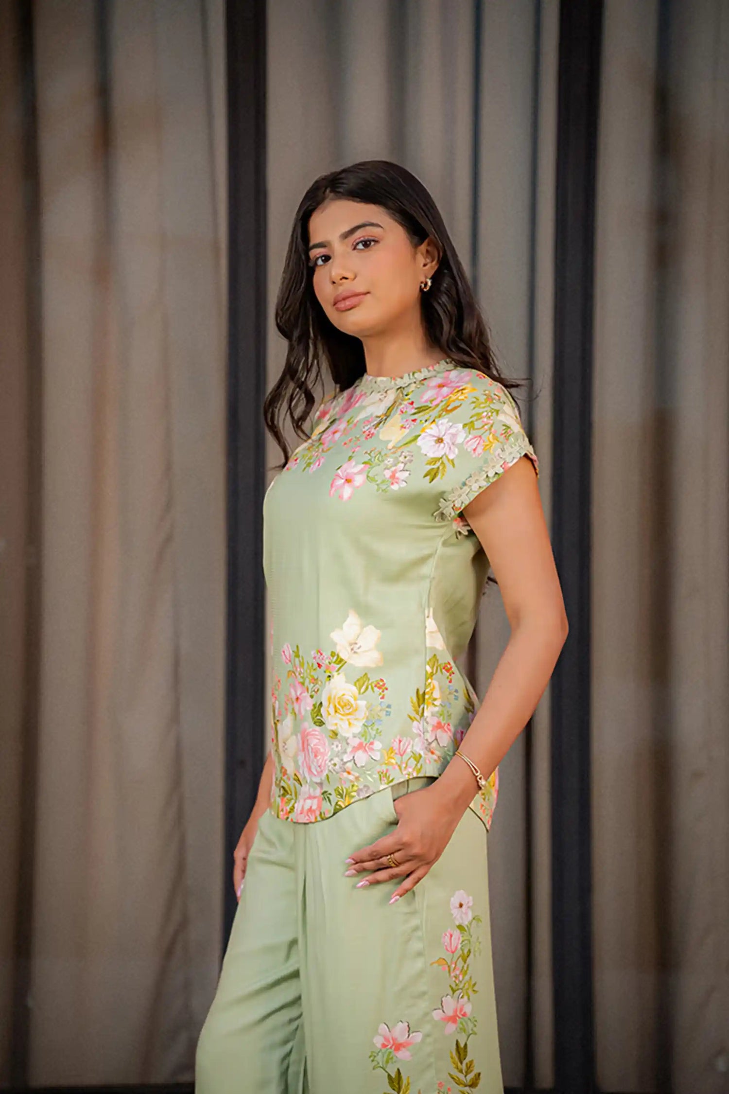 Pastel green floral coord set side view with short sleeve top and wide pants