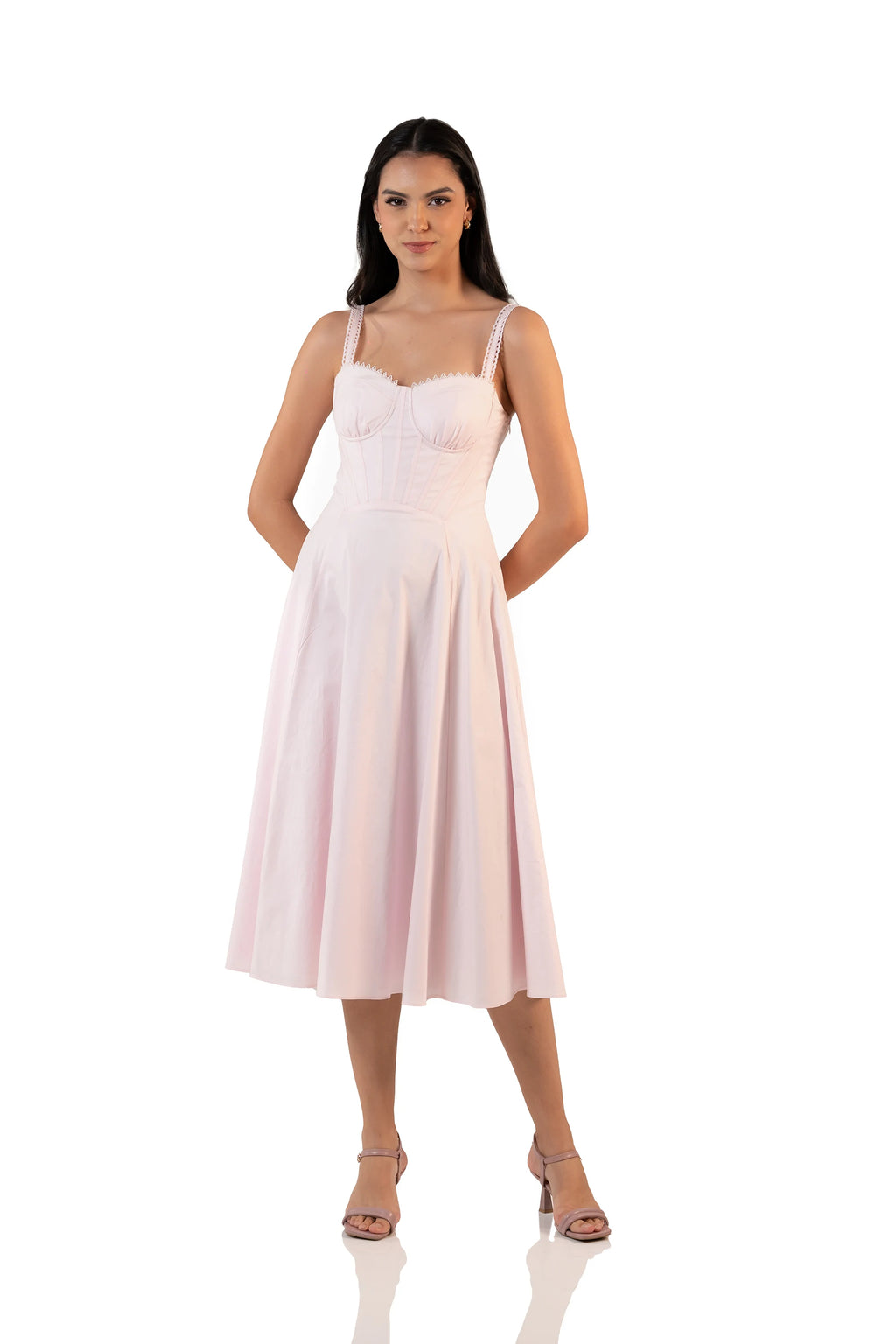 Front view of pastel pink bustier midi dress with lace-trim straps, sweetheart neckline and fit-and-flare A-line skirt