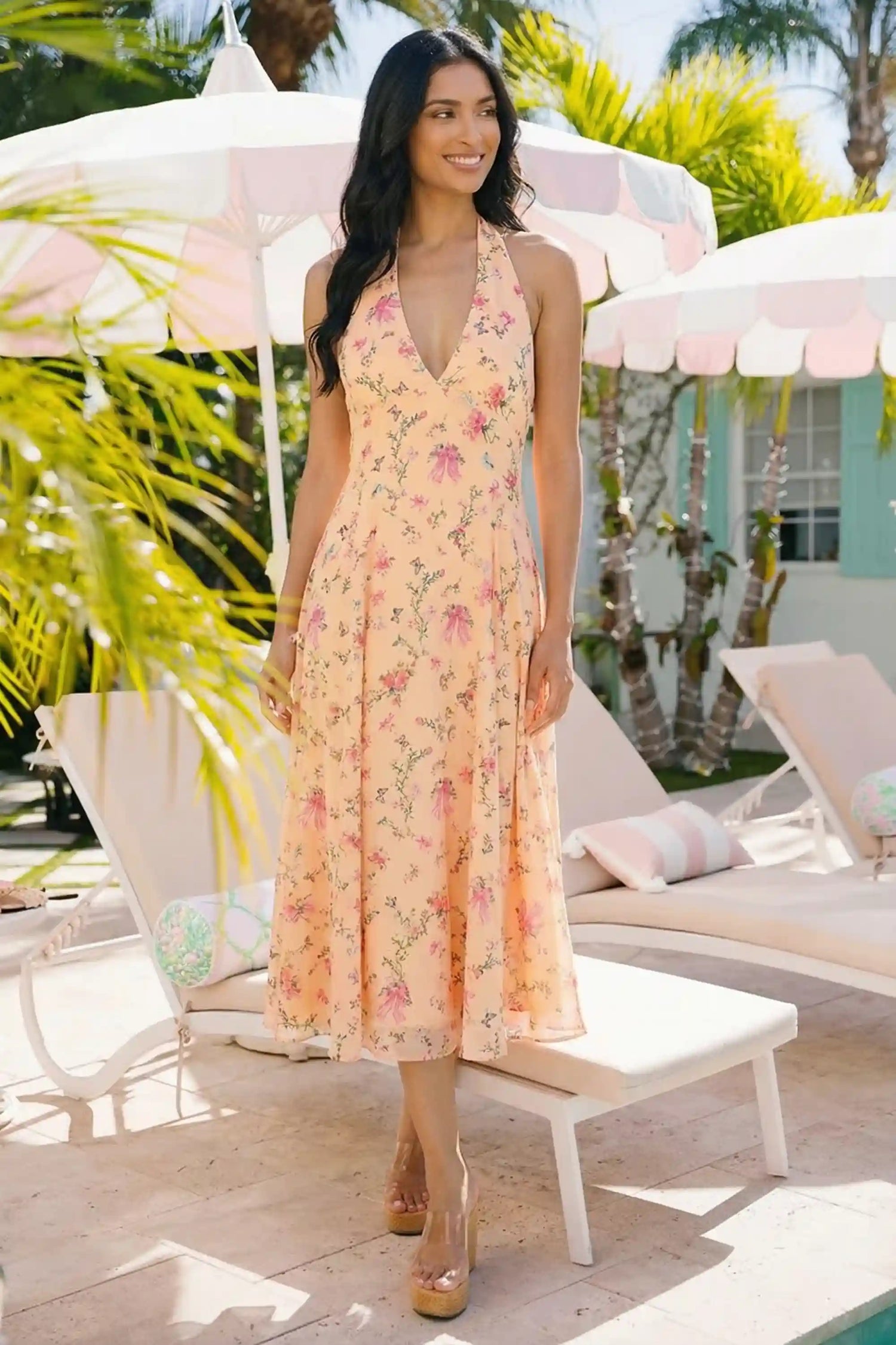 Pretty Pixie peach floral bow print halter v-neck midi dress front view summer outdoor