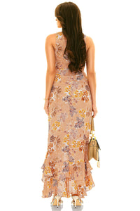Back view of peach floral sleeveless maxi dress with ruffle details