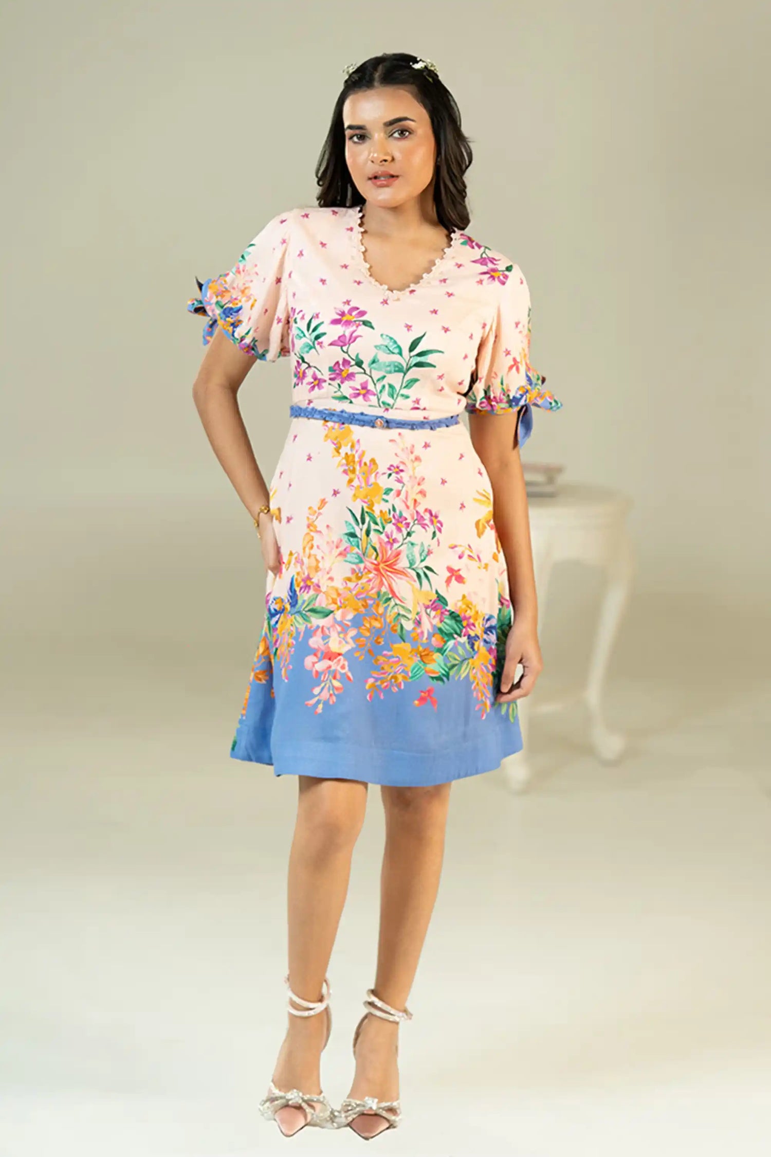 Pink and blue floral short dress with puff sleeves front pose