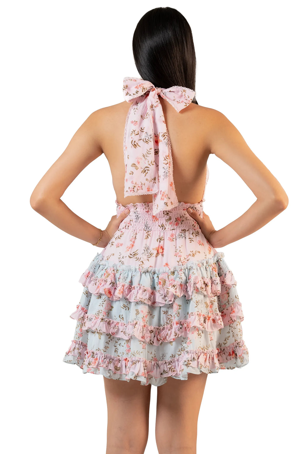 Back view: pink-blue ruffle halter mini dress with bow tie