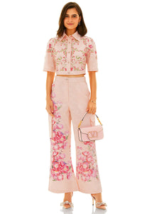 Pink floral crop shirt with wide-leg pants front view