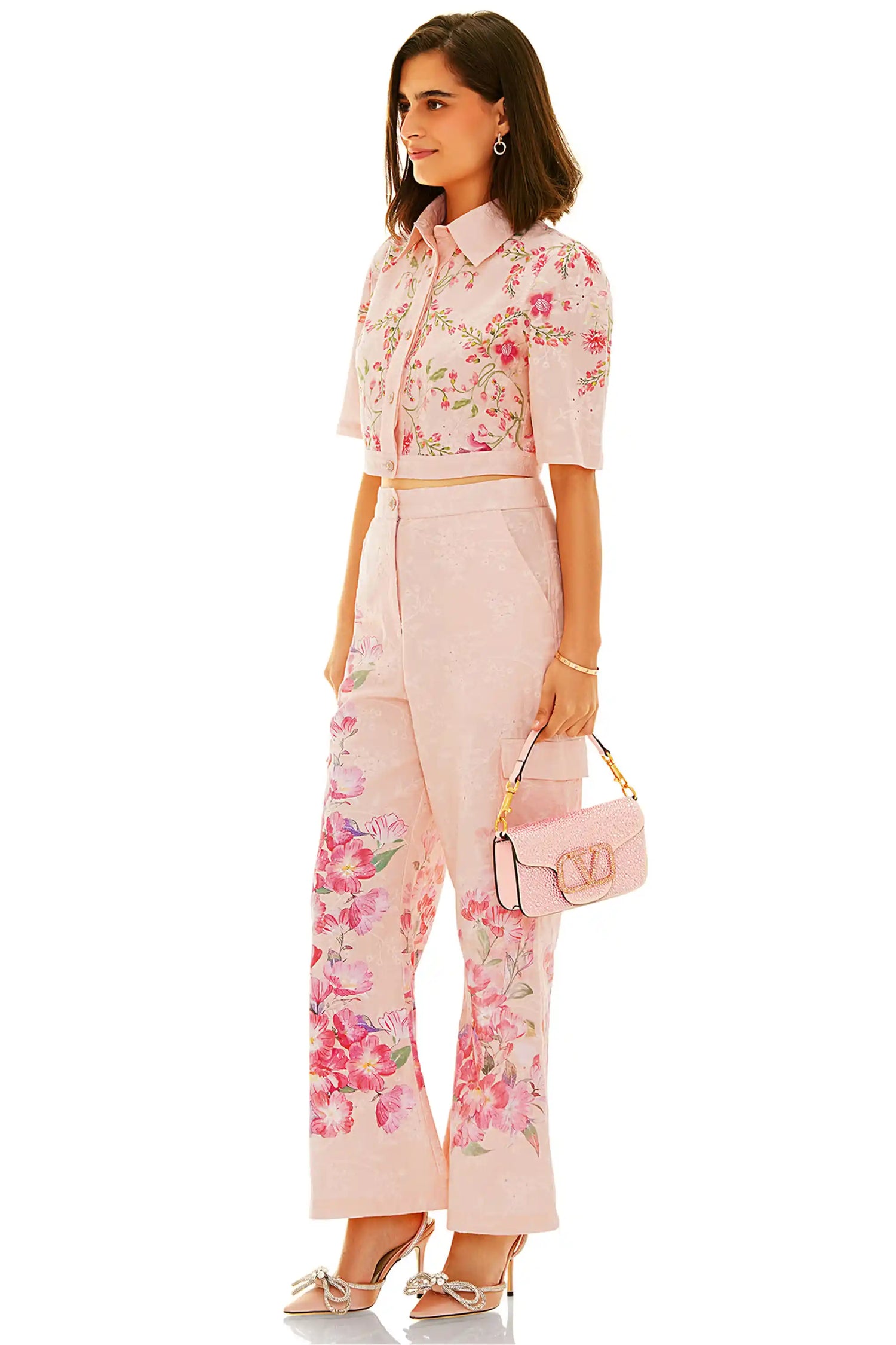 Pink floral crop shirt and printed pants side profile