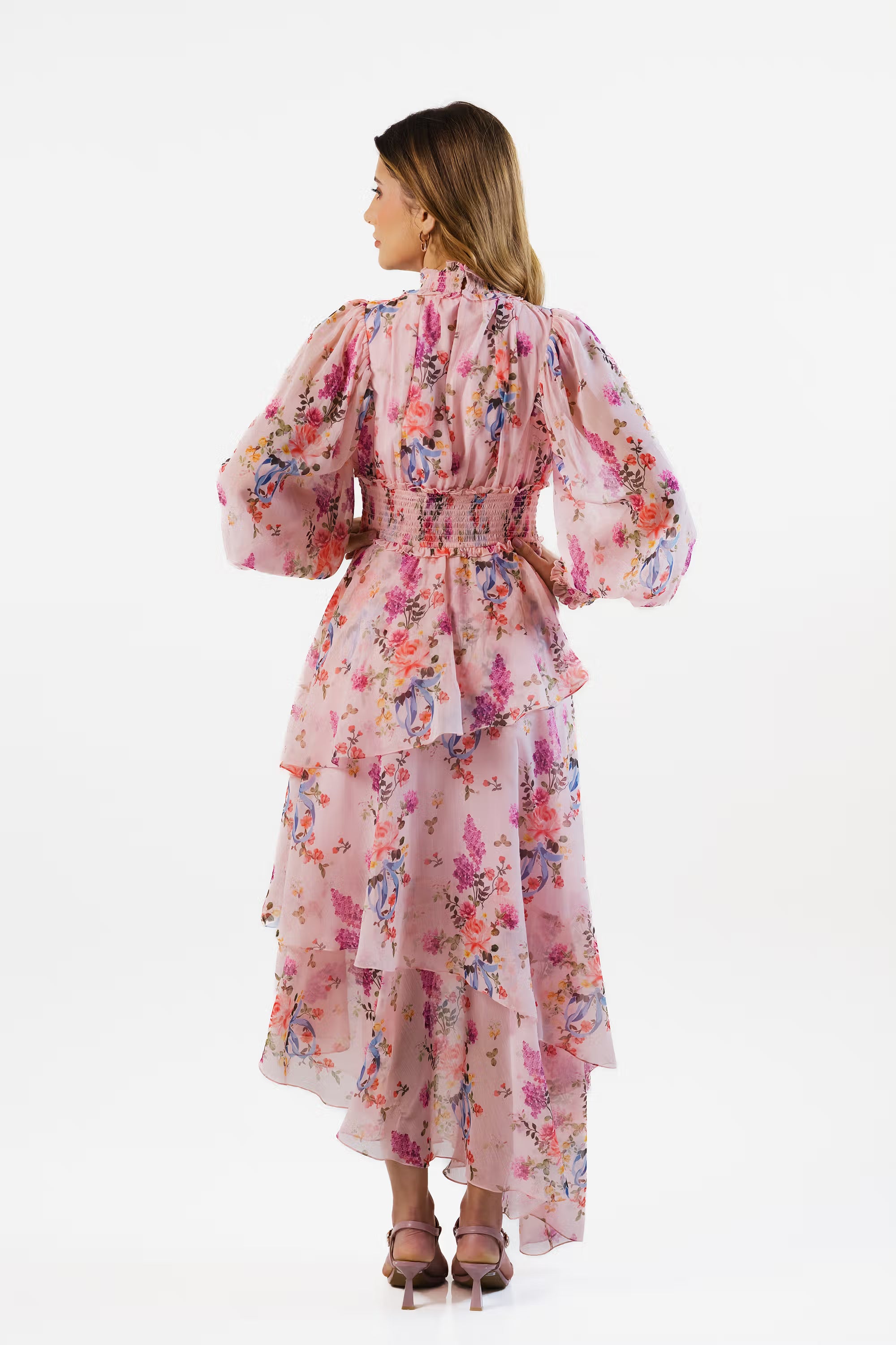 Back view of pink floral high neck maxi dress with ruffled tiered design
