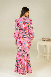 Back view of pink floral maxi dress with fitted waist