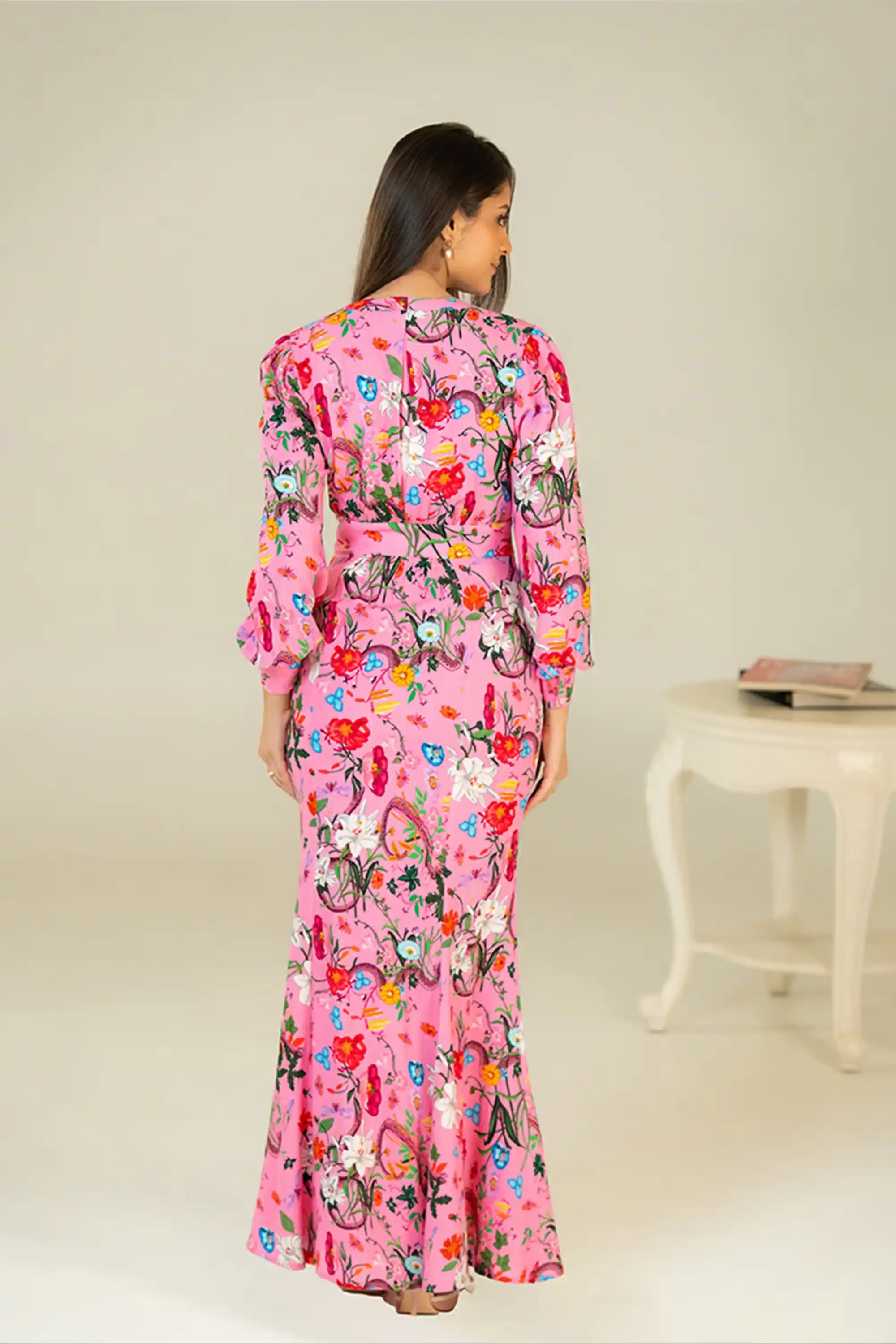 Back view of pink floral maxi dress with fitted waist