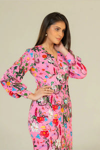 Elegant pose in pink floral maxi dress full length