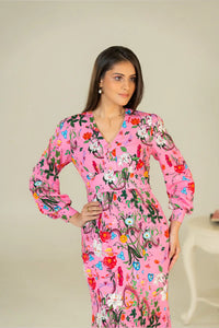 Closeup of pink floral maxi dress with waist fit