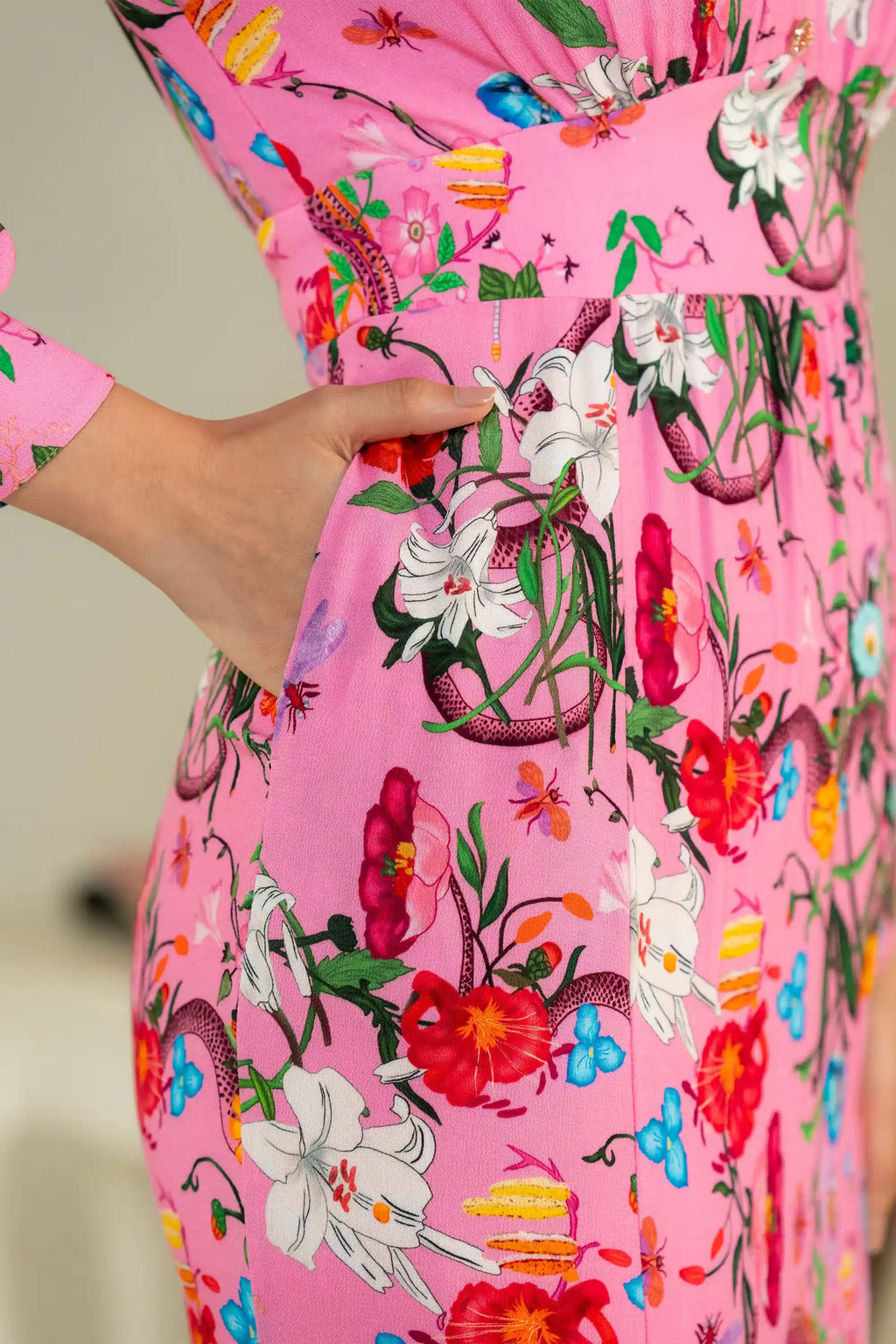 Pocket detail on pink floral long sleeve maxi dress