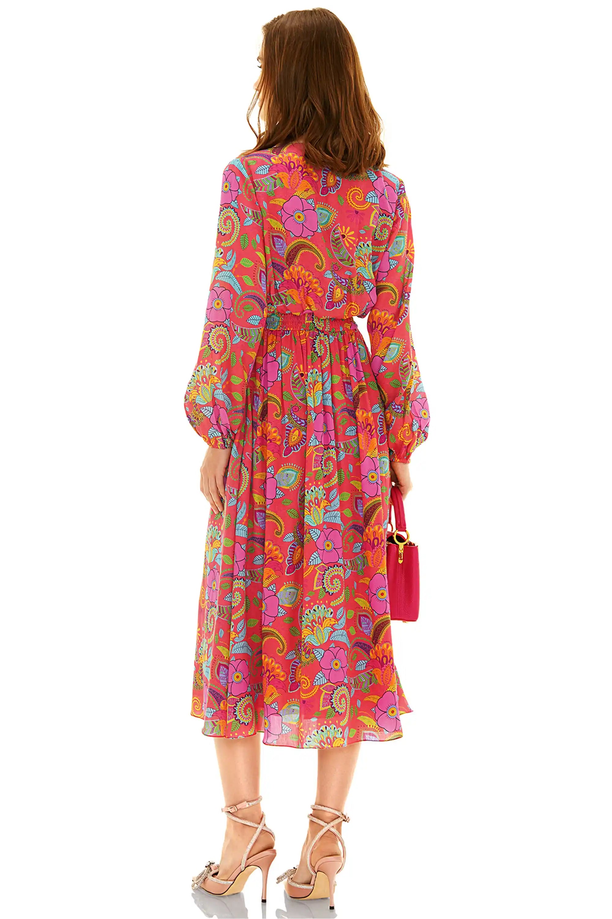 Back view of pink floral paisley V-neck midi dress with long sleeves