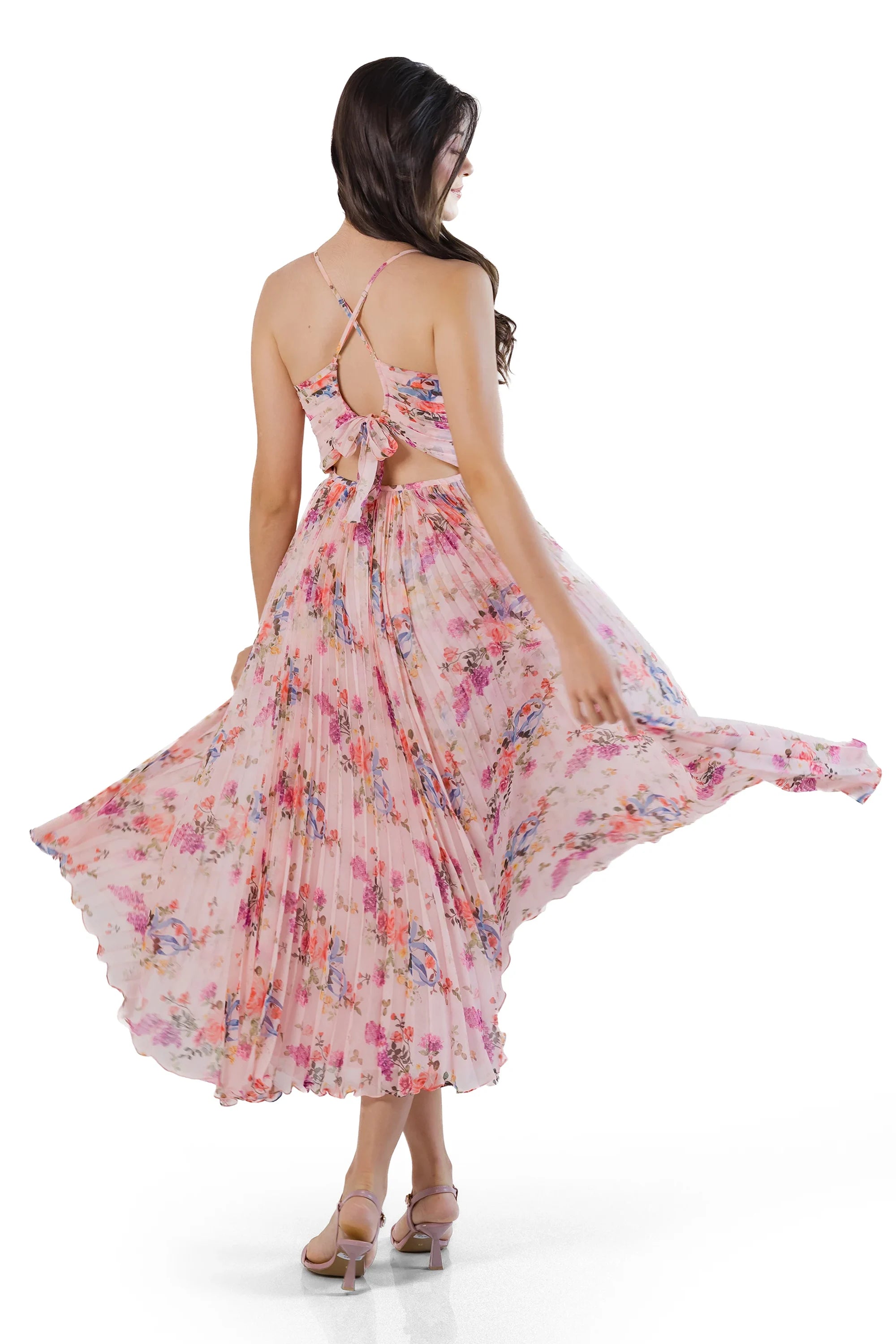 Back view twirl in pink floral pleated midi dress