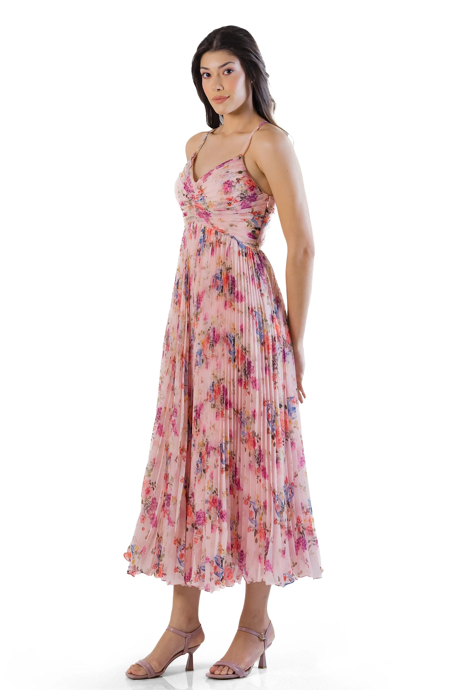 Side view of pink floral pleated midi dress on model