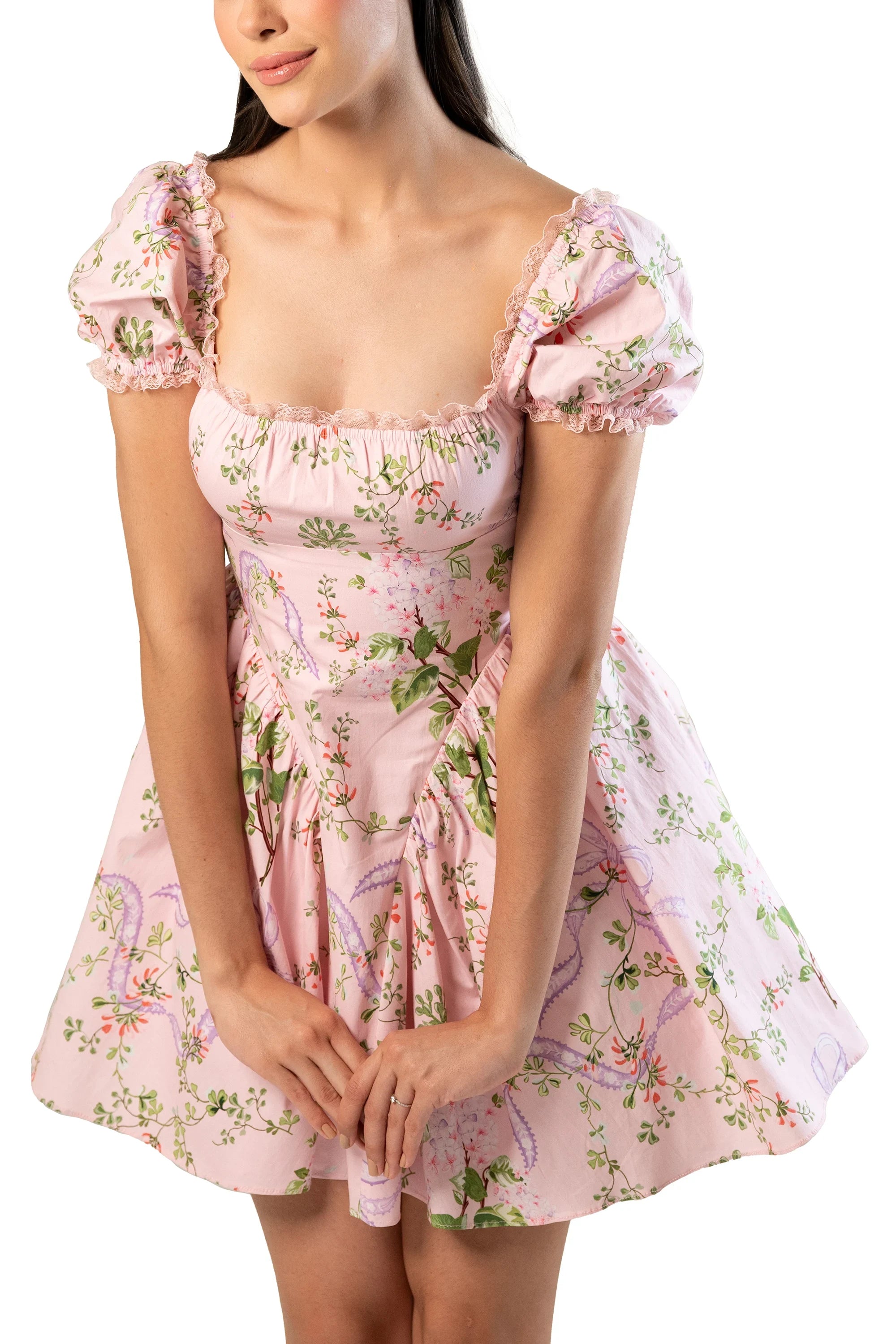 Front close-up: pink floral mini; ruched bust and lace-trim puff sleeves