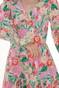 Close-up of Pretty Pixie pink floral puff-sleeve mini dress