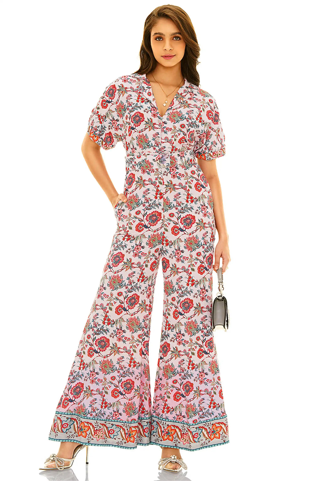 Front view of pink floral printed wide-leg v-neck jumpsuit for women