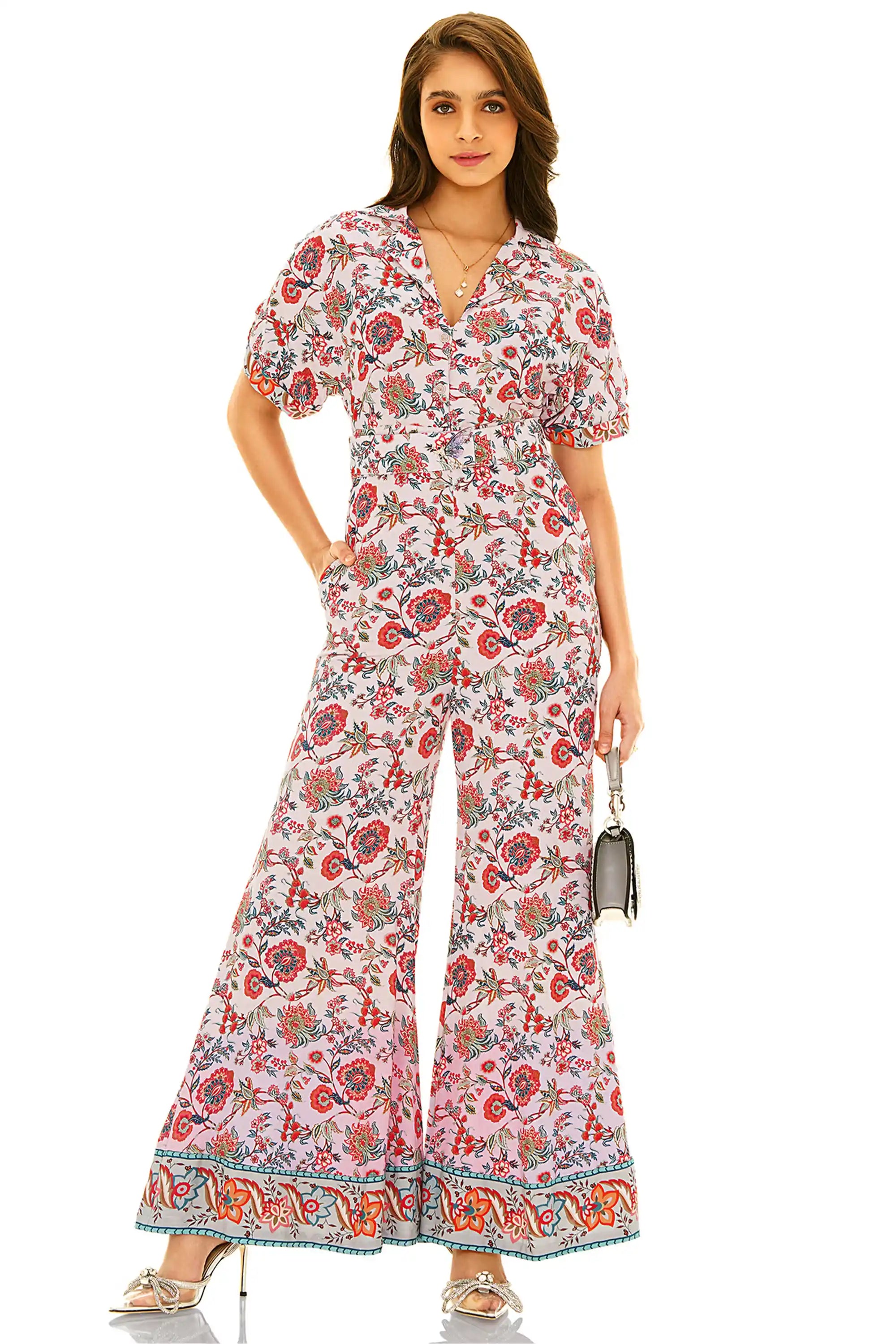 Front view of pink floral printed wide-leg v-neck jumpsuit for women