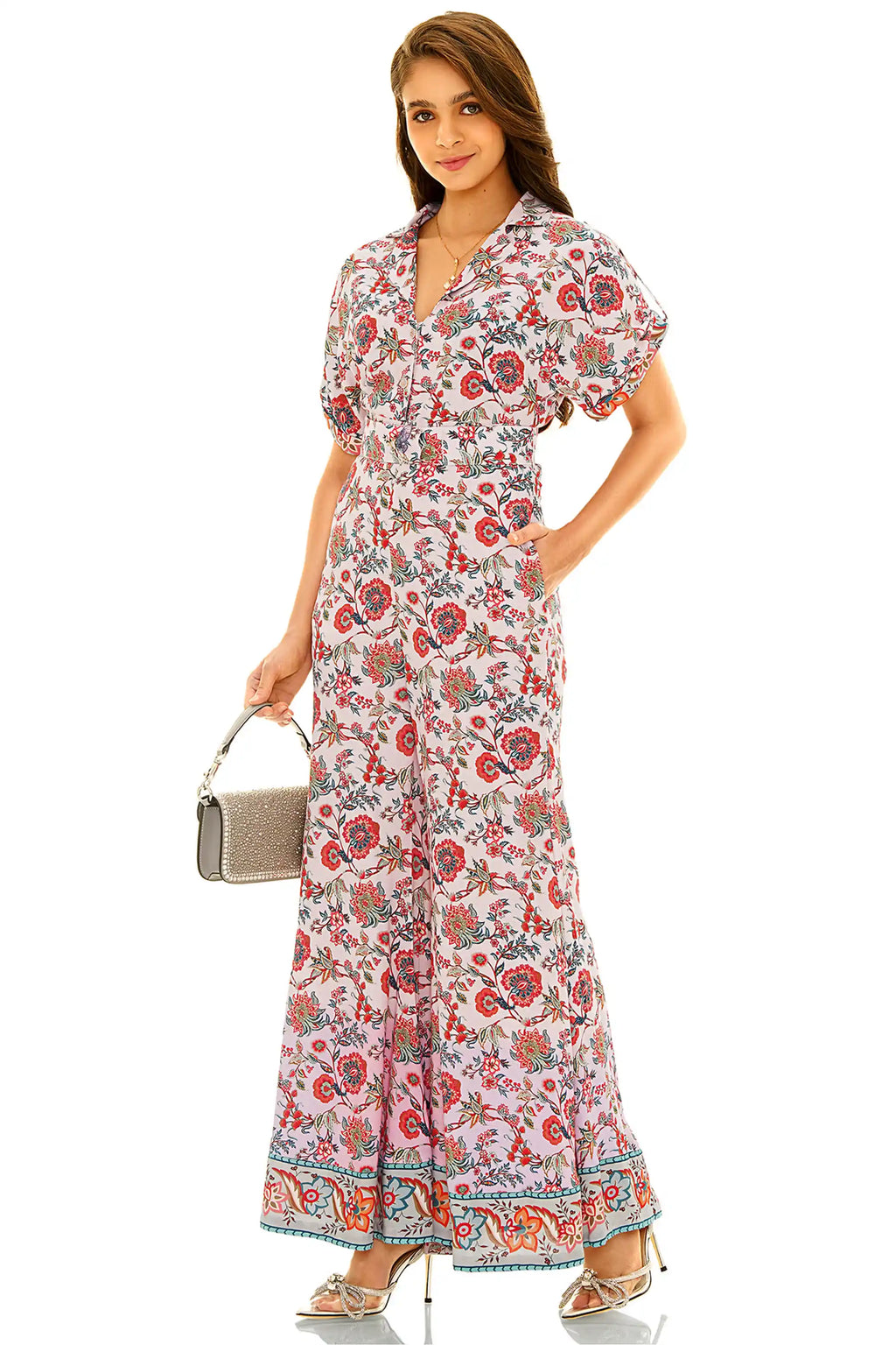 Side view of pink floral wide-leg v-neck jumpsuit with short sleeves
