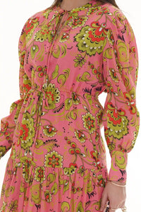Close-up of Pretty Pixie pink and green floral tie-neck tiered dress, drawstring waist detail