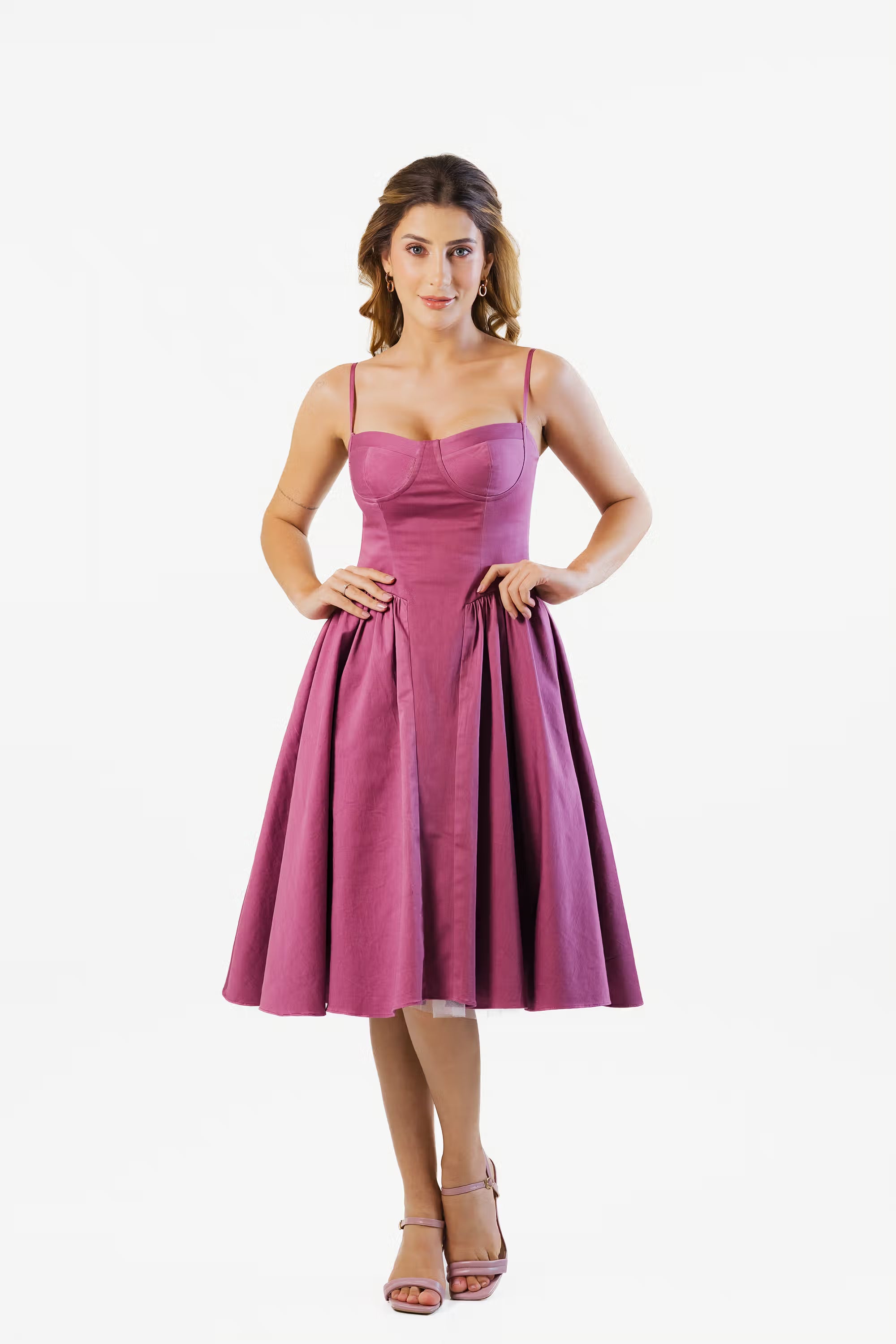 Plum midi dress for women featuring elegant sleeveless fit and flare design, perfect for evening wear.