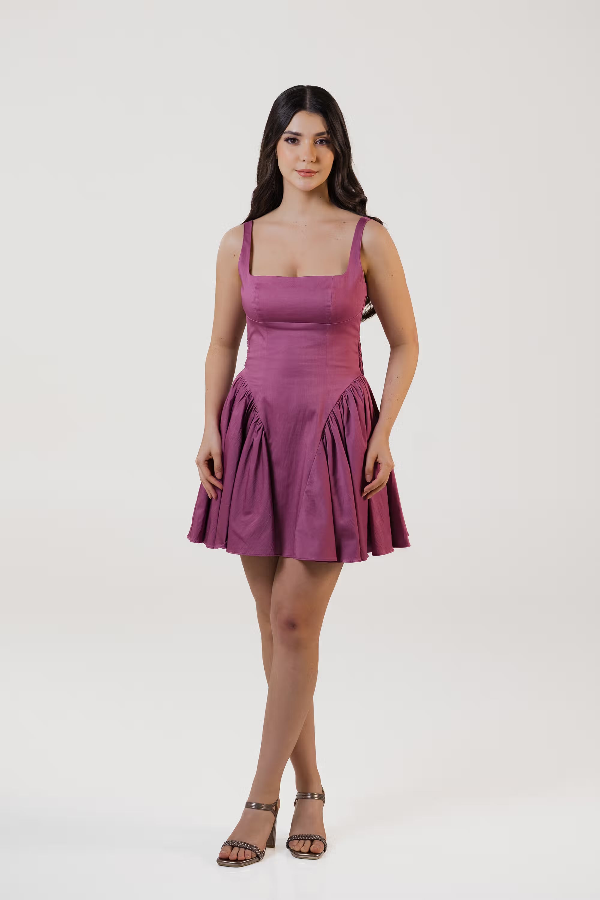 Front view of plum purple square-neck mini dress with fitted bodice and flared skirt