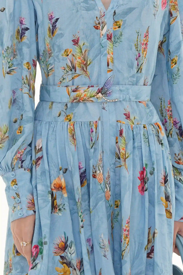 Close-up of Pretty Pixie powder blue one-shoulder floral ruffle midi dress