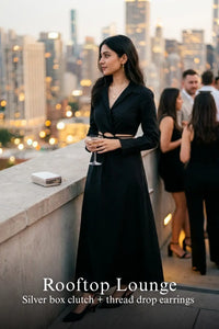 Pretty Pixie black cutout maxi shirt dress for rooftop lounge.