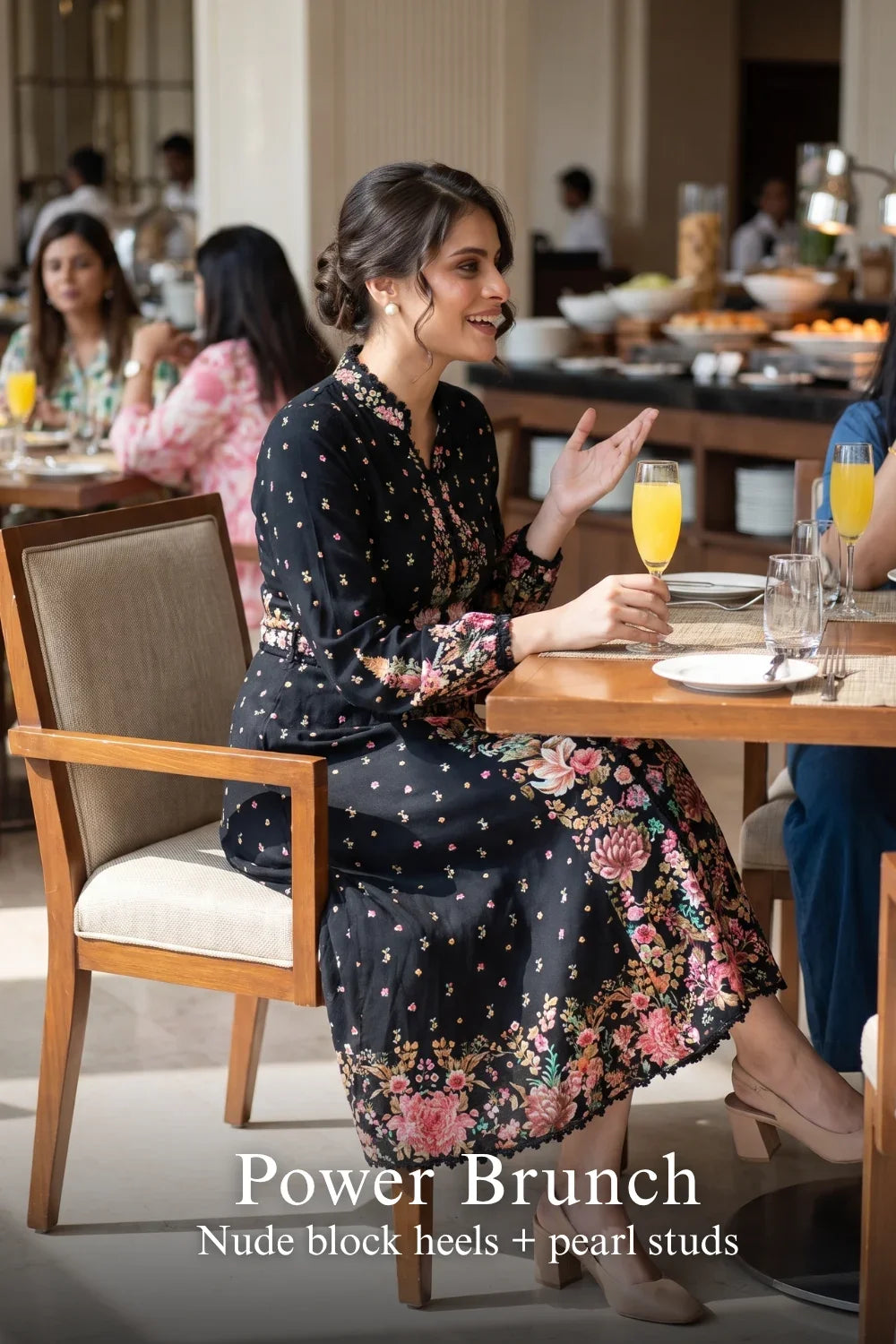 Pretty Pixie twilight garden black floral belted midi dress for power brunch.