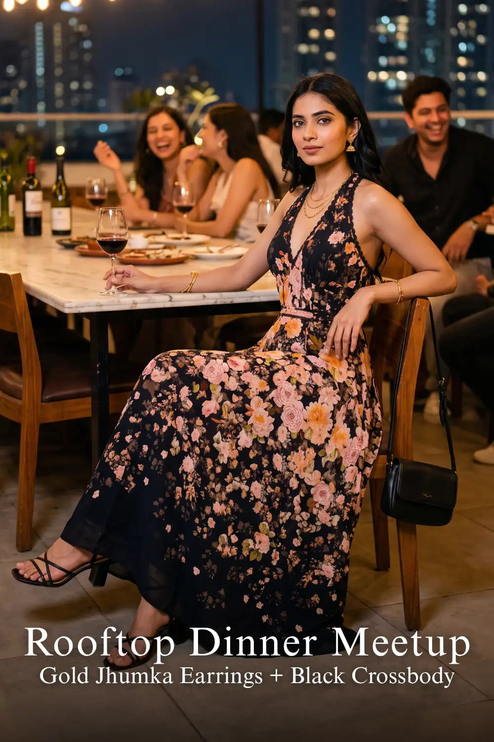 Black floral halter maxi dress with gold jhumka earrings, rooftop dinner look - Pretty Pixie evening wear