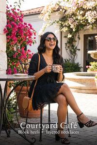 Pretty Pixie black lace-trim pleated v-neck tiered dress for courtyard cafe.