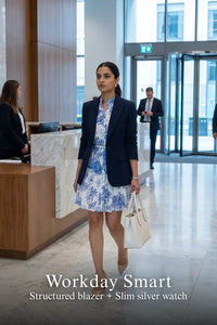 Woman in Pretty Pixie indigo toile button-front belted tiered mini dress styled for a workday smart