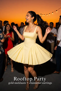 Pretty Pixie lemon pleated square-neck mini dress for rooftop party.