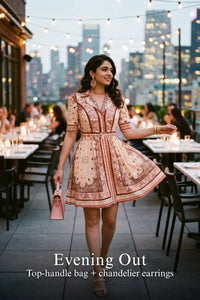 Woman in Pretty Pixie bandana print v-neck belted mini dress styled for an evening out