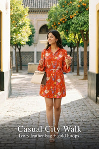 Woman in Pretty Pixie crimson floral belted mini dress styled for a casual city walk