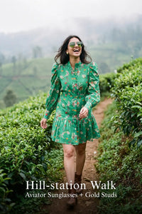 Woman in Pretty Pixie floral puff-sleeve smocked mini dress styled for a hill station walk