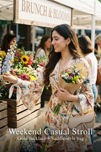Woman in Pretty Pixie ivory floral wrap long-sleeve mini dress styled for a weekend casual stroll
