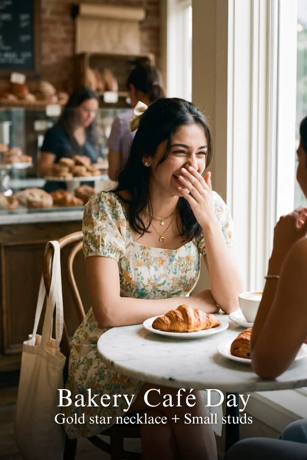 Woman in Pretty Pixie pastel floral puff-sleeve mini dress styled for a bakery cafe day