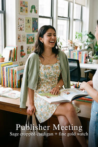 Woman in Pretty Pixie pastel floral puff-sleeve mini dress styled for a publisher meeting