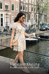 Woman in Pretty Pixie pastel floral puff-sleeve mini dress styled for a vacation outing