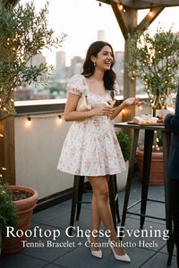 Pretty Pixie ivory puff-sleeve floral mini dress for rooftop cheese evening.