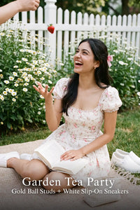 Pretty Pixie ivory puff-sleeve floral mini dress for garden tea party.